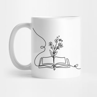 Flowers growing from book Mug